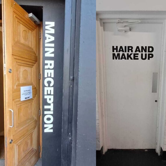 An image of the door and wall graphics for the main reception and hair & makeup.
